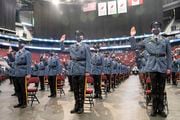 Members of the 161st class recite the State Police Oath to become Troopers. At the Prudential Center in Newark, 144 cadets graduate during a ceremony for the 161st New Jersey State Police Class. Wednesday, March 17, 2021. Newark, N.J. USA (Aristide Economopoulos | NJ Advance Media)   