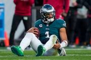 Philadelphia Eagles quarterback Jalen Hurts reacts after being sacked by the Arizona Cardinals during the second half of an NFL football game, Sunday, Dec. 31, 2023, in Philadelphia. (AP Photo/Matt Slocum)