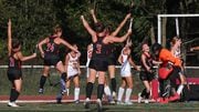 Hunterdon Central reacts after a goal scored by Ashley Gebhardt (34) against Voorhees during the field hockey game at Voorhees High School on Thursday, September 21, 2023.