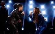 Mara Justine performs a duet with her coach, Niall Horan, in the finale of "The Voice."