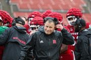 Rutgers Scarlet Knights head coach Greg Schiano emerges from the huddle late in the second quarter of the Scarlet-White Spring game, Saturday, April 29, 2023 in Piscataway, N.J.