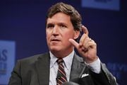 Tucker Carlson shows how much he cares about the conservative principle of free markets. (Photo by Chip Somodevilla/Getty Images)