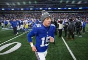New York Giants quarterback Tommy DeVito (15) runs off the field after the Giants lost to the Los Angeles Rams, 26-25, Sunday, Dec. 31, 2023 in East Rutherford, N.J. DeVito, who started the last few games for the Giants, did not play.